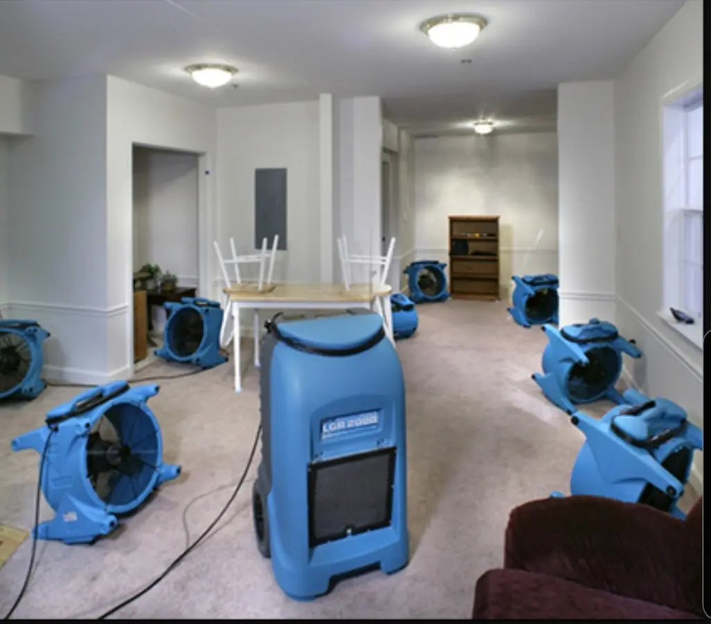 Air movers and dehumidifier setup for Water Damage Restoration in Kingman